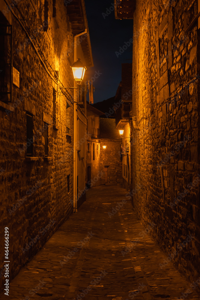 Night view of narrow cobbled street in medieval village Anso.Aragon Pyrenees mountains, Anso is one of the most beautiful villages in Spain.