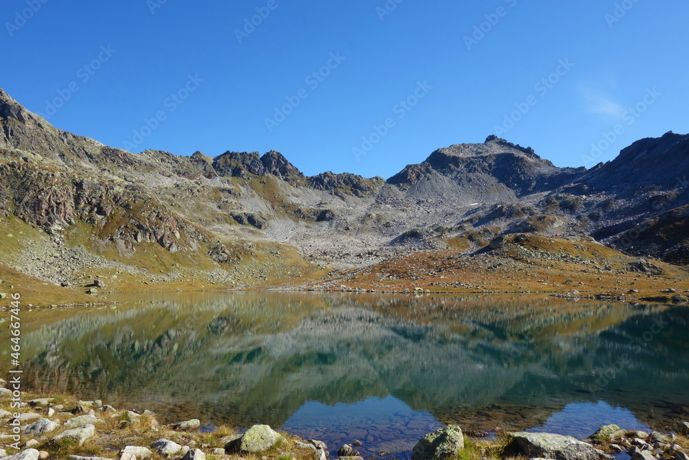 Mountain landscape with small lakes and great view of Swiss Alps in Klosters, Davos, Switzerland