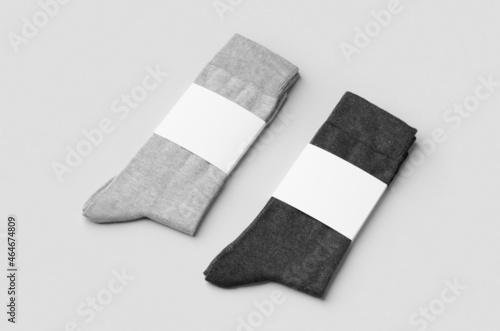 Light and dark grey socks mockup with blank label. photo