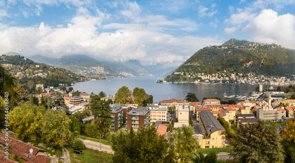 Panoramic view of Lake Como and Como town in a sunny autumn day, Italy
