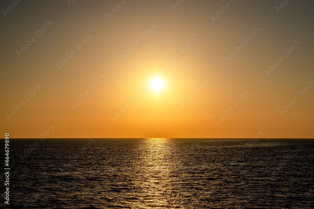 Sunset into the sea horizontal