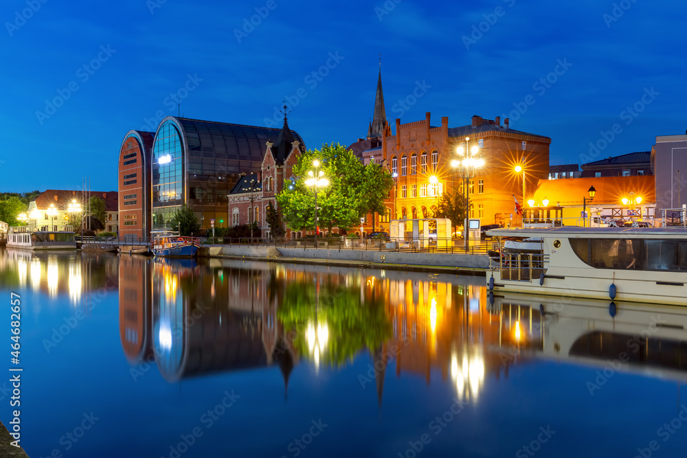 Panorama of Old town with reflection in Brda River at night, Bydgoszcz, Poland Panorama of Old town with reflection in Brda River at night, Bydgoszcz, Poland
