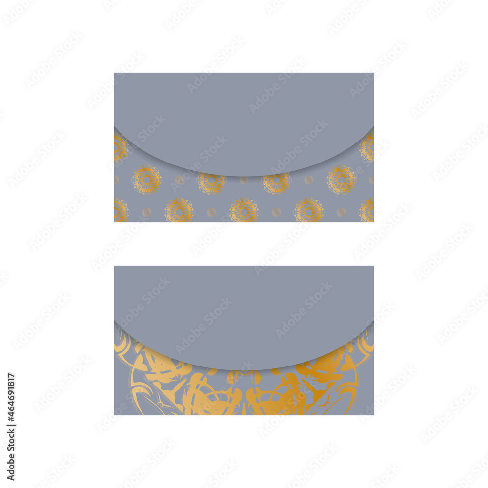 Business card in gray with a mandala in gold ornaments for your brand. Business card in gray with a mandala in gold ornaments for your brand.