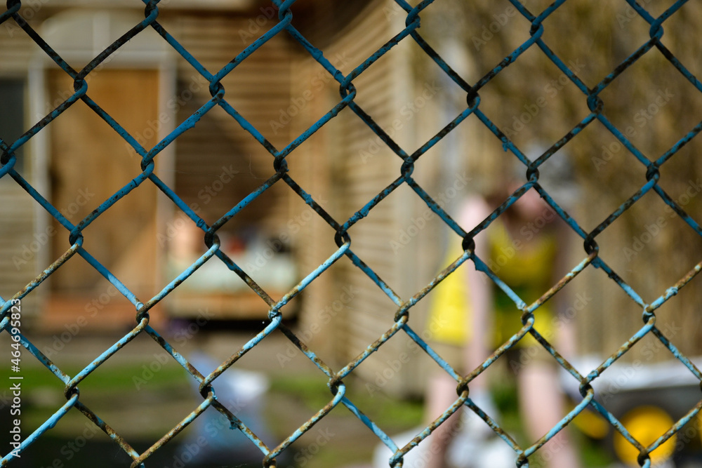 Lattice texture. Macro. Close-up foreground. Blurred background. Man in blur Lattice texture. Macro. Close-up foreground. Blurred background. Man in blur