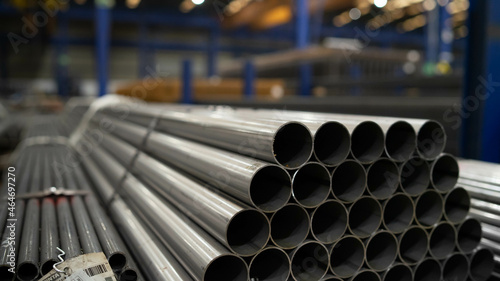 Fotografering Closeup of gray Industrial steel pipes with blurred background