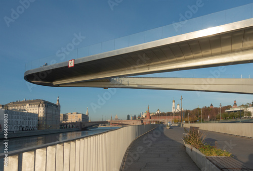 Moskvoretskaya embankment and the floating bridge on a sunny autumn morning in Moscow photo