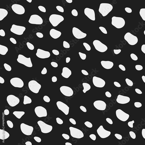 Random white spots. Vector with black background and shapeless white spots.