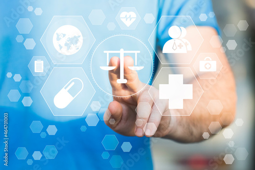 Doctor hand presses the button icon justice healthcare. Labor Law Lawyer Legal Concept in medical on the theme of healthcare.