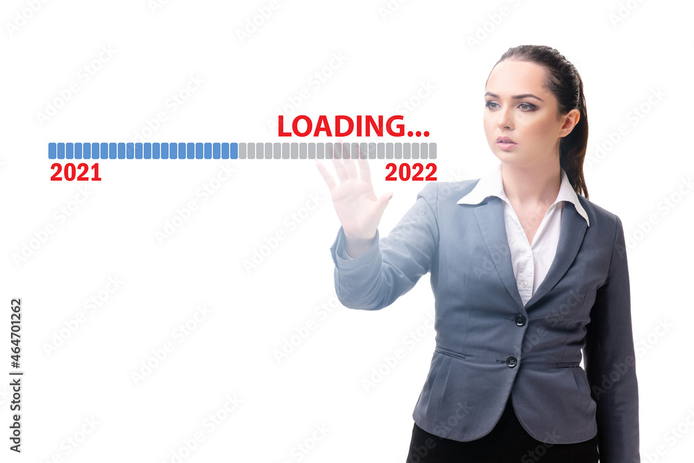 Businesswoman pressing virtual button with year 2022 Businesswoman pressing virtual button with year 2022