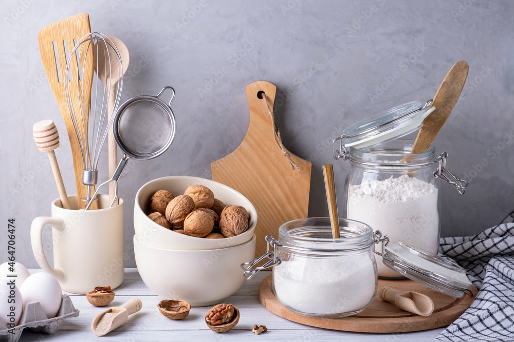 Close-up of kitchen utensils and containers made of wood, metal and glass. Ingredients for baking pie. Eco-friendly materials, no plastic concept. Selective focus. Close-up of kitchen utensils and containers made of wood, metal and glass. Ingredients for baking pie. Eco-friendly materials, no plastic concept. Selective focus.