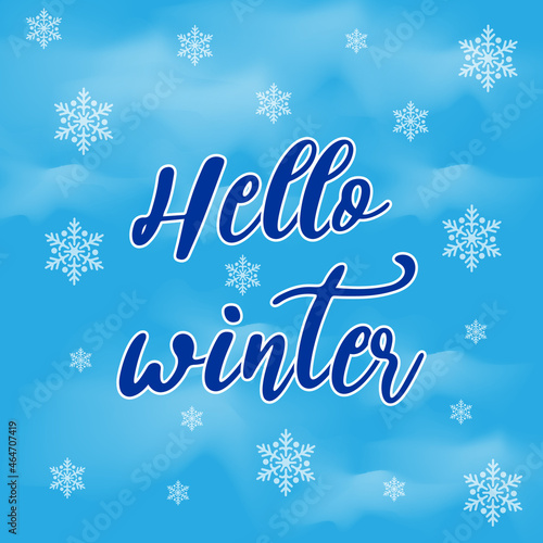 Hello winter text. Brush lettering on a blue winter background with snowflakes. Vector card design