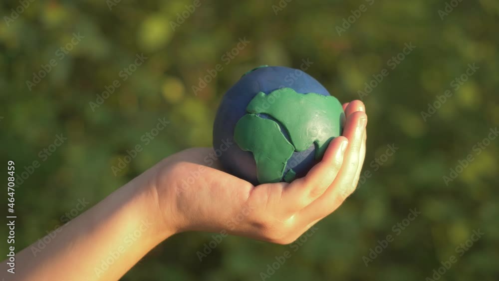 Child Hands Holding Earth Model Clay Rainbow Ecology Concept Top Stock  Photo by ©galiaromaniv88@gmail.com 489952540