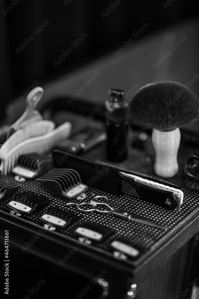 Barber shaving kit and brush lying in box. Set of professional hairdresser tools Concept of hygiene beauty and haircare.