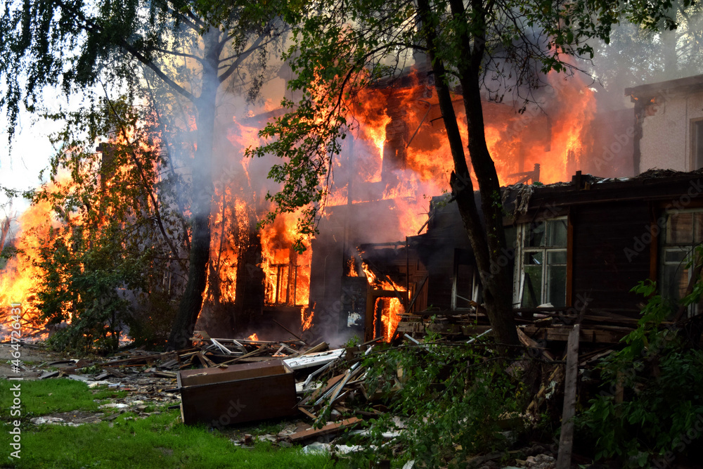 Walking down the street, I saw an old abandoned house in which a fire had started. Later firefighters arrived and started extinguishing it. But it was too late. The house burned to the ground.