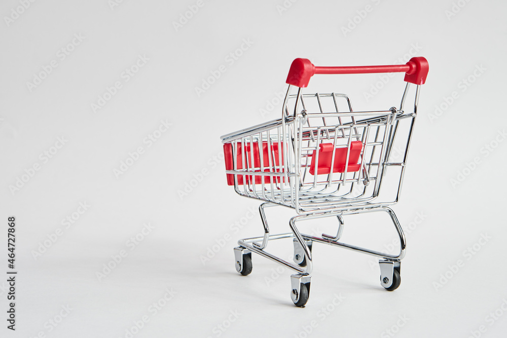 empty trolley on light background shopping supermarket service