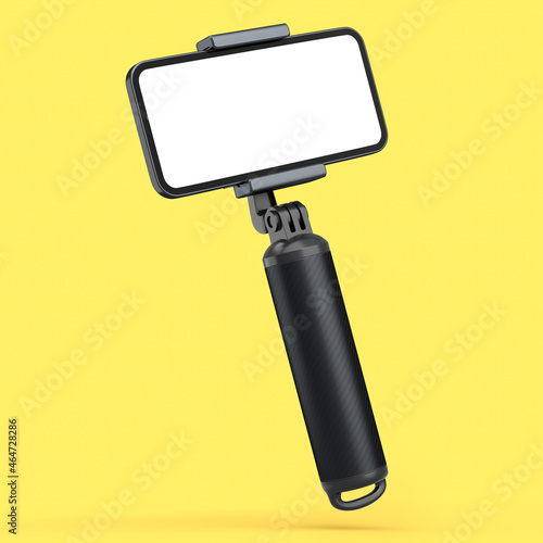 Realistic smartphone with blank white screen and selfie stick isolated on yellow