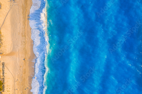 Aerial top down view of turquoise waters of Milos Beach, Lefkada island, Greece