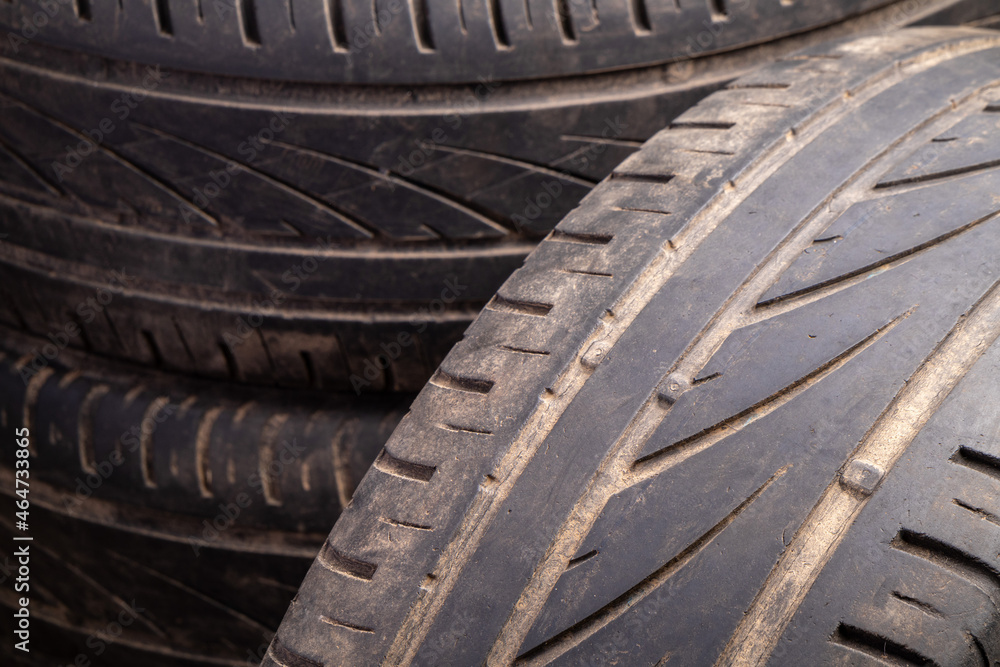 old used tire surface with wear indicators