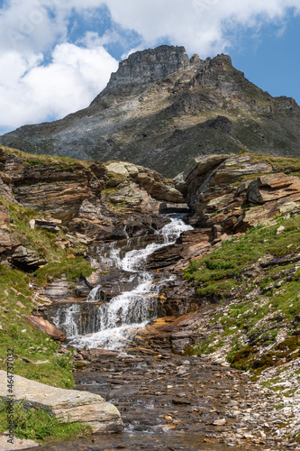 Vals, Switzerland, August 21, 2021 Little waterfall in the alps