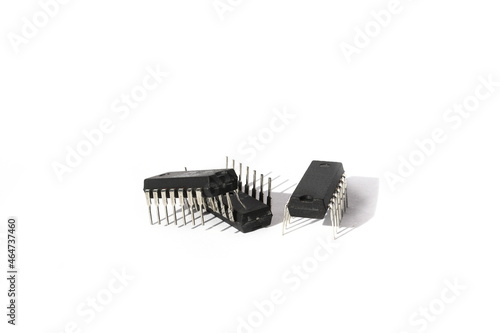 Three pieces of integrated circuit chips. Microchips concept on white background. Electronic components. Lack of chips for cars.