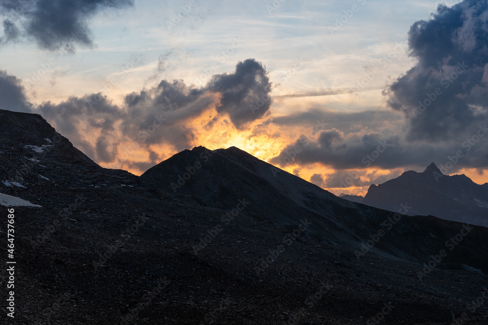 Vals, Switzerland, August 21, 2021 Burning sky after sunset at the mount Fanellhorn