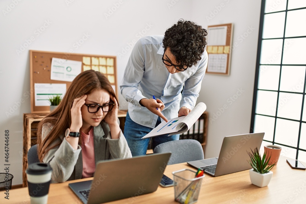 Business boss angry with stressed employee at the office. Business boss angry with stressed employee at the office.