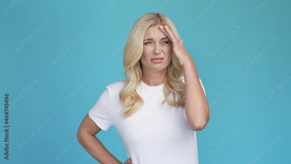 Irritated tired exhausted lady suffer terrible headache Irritated tired exhausted lady suffer terrible headache