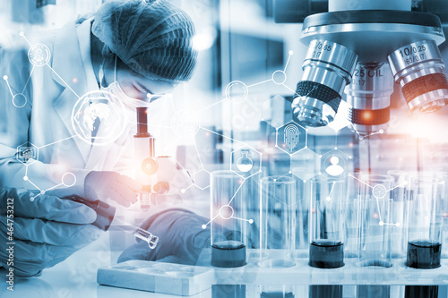 Double exposure microscope Young woman scientific using equipment in the laboratory for research.Biotechnology,development,chemical,study,vaccine,COVID-19. Photo concept experimentation and research.