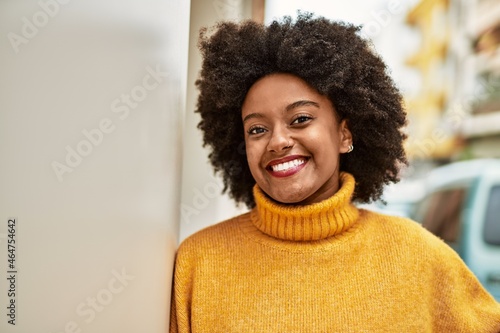 Young african american girl smiling happy standing at the city. © Krakenimages.com