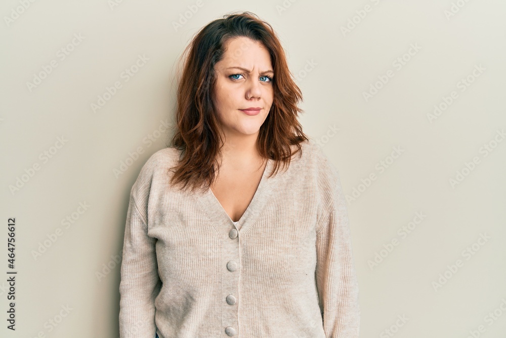 Young caucasian woman wearing casual clothes skeptic and nervous, frowning upset because of problem. negative person. Young caucasian woman wearing casual clothes skeptic and nervous, frowning upset because of problem. negative person.