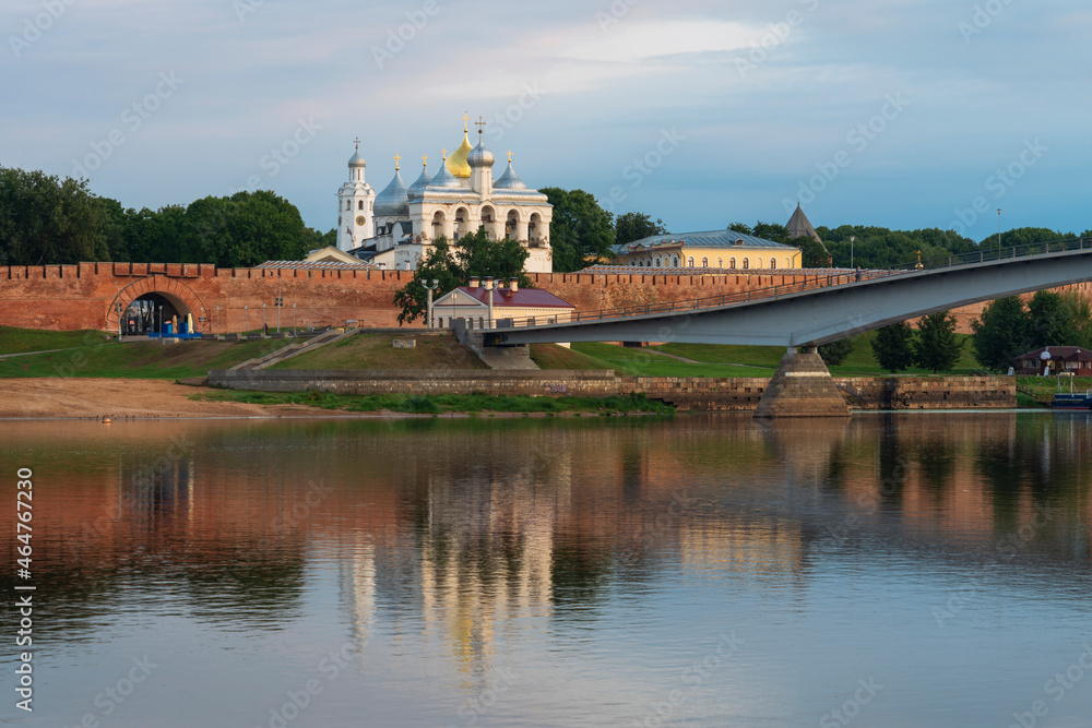 View of the Sofia Embankment, the Novgorod Kremlin and the Humpback Bridge from the opposite bank of the Volkhov River on an early cloudy summer morning, Veliky Novgorod, Novgorod Region, Russia