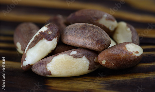 Small pile of Brazil nuts on wooden surface