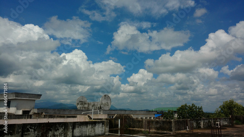 Cumulus clouds in the blue sky at noon