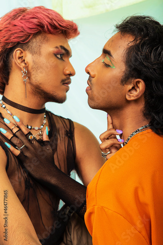 Canvas Print Malaysian Indian men posed in front of a cloth backdrop in a studio setting