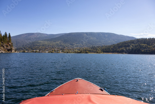 Boat riding on Kootenay River. Sunny Fall Season Morning. Located in Nelson, British Columbia, Canada. © edb3_16