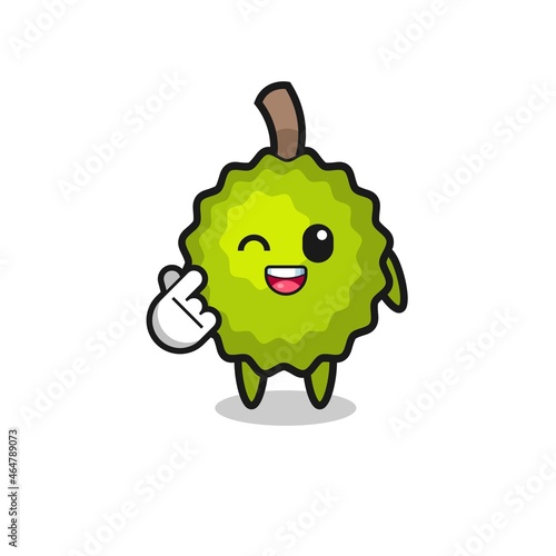 durian character doing Korean finger heart