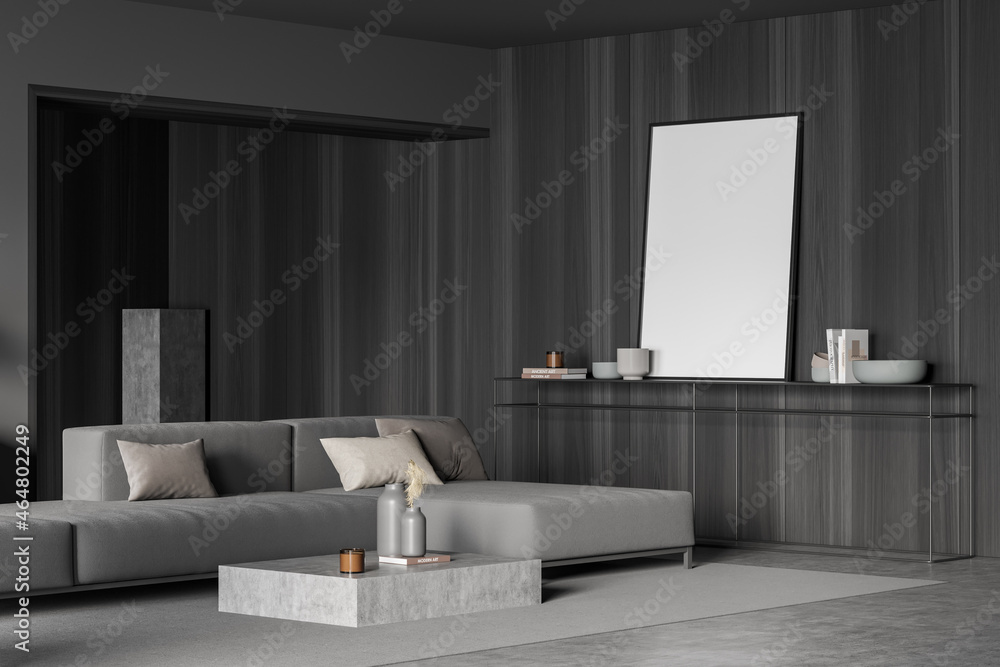 Fototapeta premium Grey living room with canvas standing on frame sideboard. Corner view.