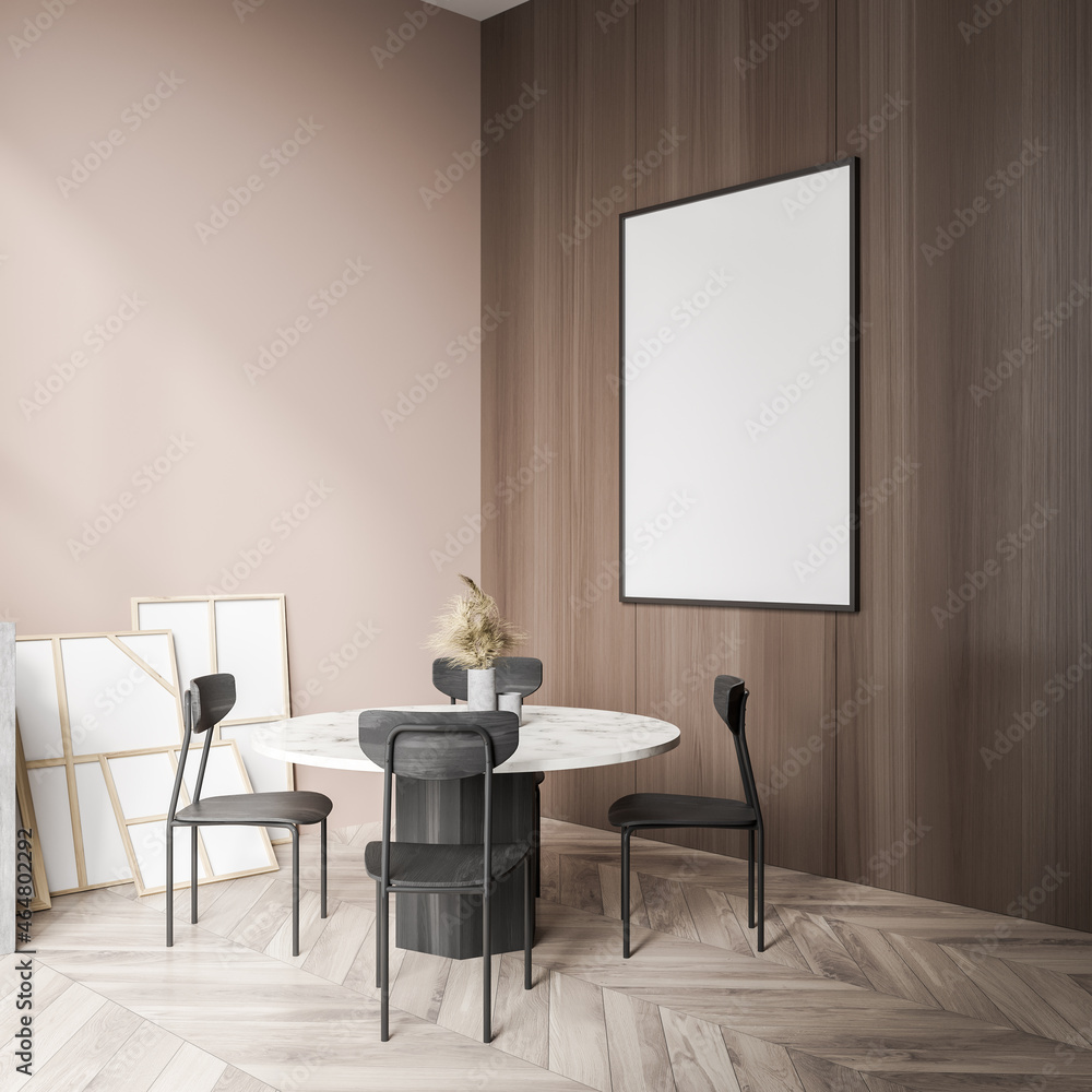Canvas on wood wall of beige living room with table. Corner view. Canvas on wood wall of beige living room with table. Corner view.