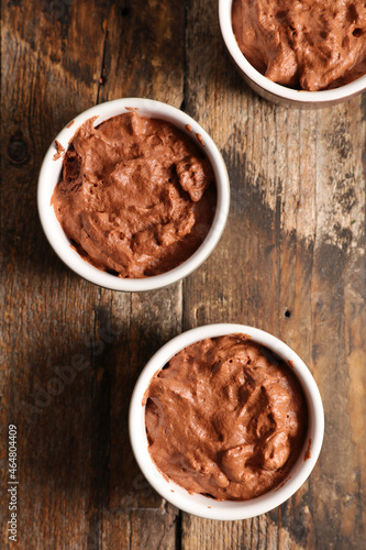 delicious homemade chocolate mousse on wood background