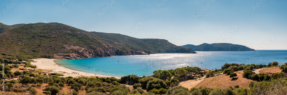 Panoramic view of Plage d'Arone beach and turquoise mediterranean sea on the west coast of Corsica