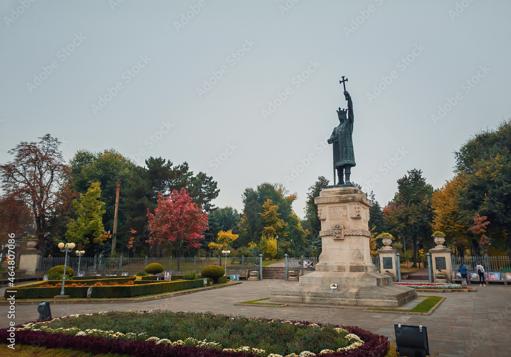 Stephen III The Great monument (Stefan cel Mare statue) in front of the park in a rainy autumn day, Chisinau city, Moldova