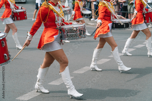 Young girls drummer at the parade. Street performance. Majorettes in the parade photo