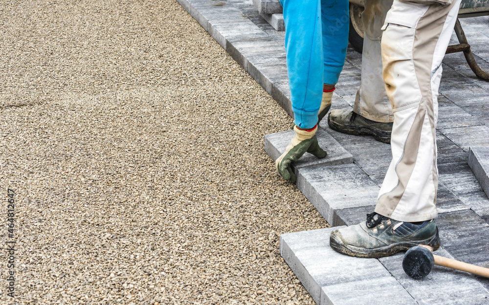 paving blocks. worker are installing paving blocks
paving blocks. worker are installing paving blocks