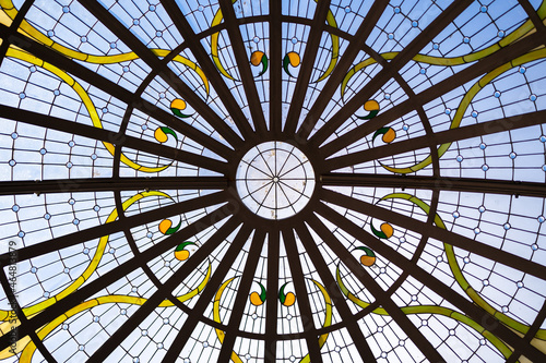 Image of a multicolored stained glass window with irregular block pattern. Stained glass window. 