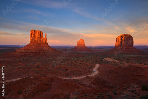 beautiful scenic sandstone buttes with sunrise sky, Monument Valley, Landmark of Arizona Utah border.