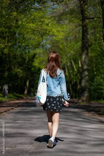 asian woman in jeans jacket