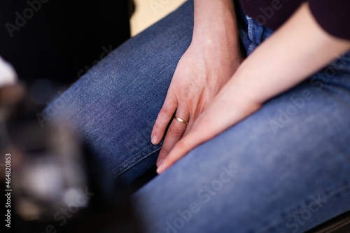 close up of hands of woman waiting