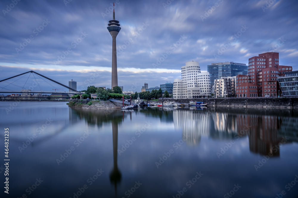 Obraz premium Evening at Medienhafen with the rhine tower in Düsseldorf, Germany