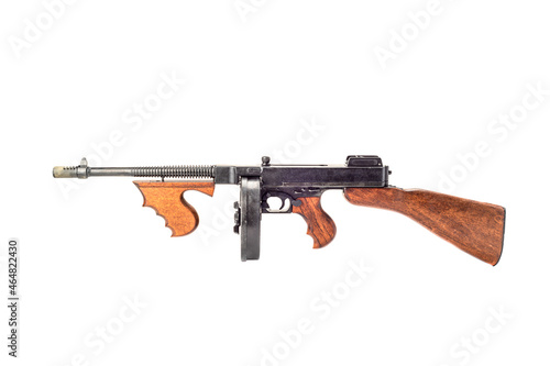 Old submachine gun of the Thompson system isolated on white background. photo