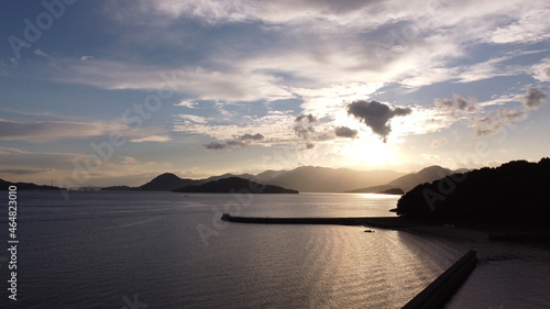 山口県観光地ドローン空撮　朝日の光と瀬戸内海の島々と柳井市の街並み！ photo